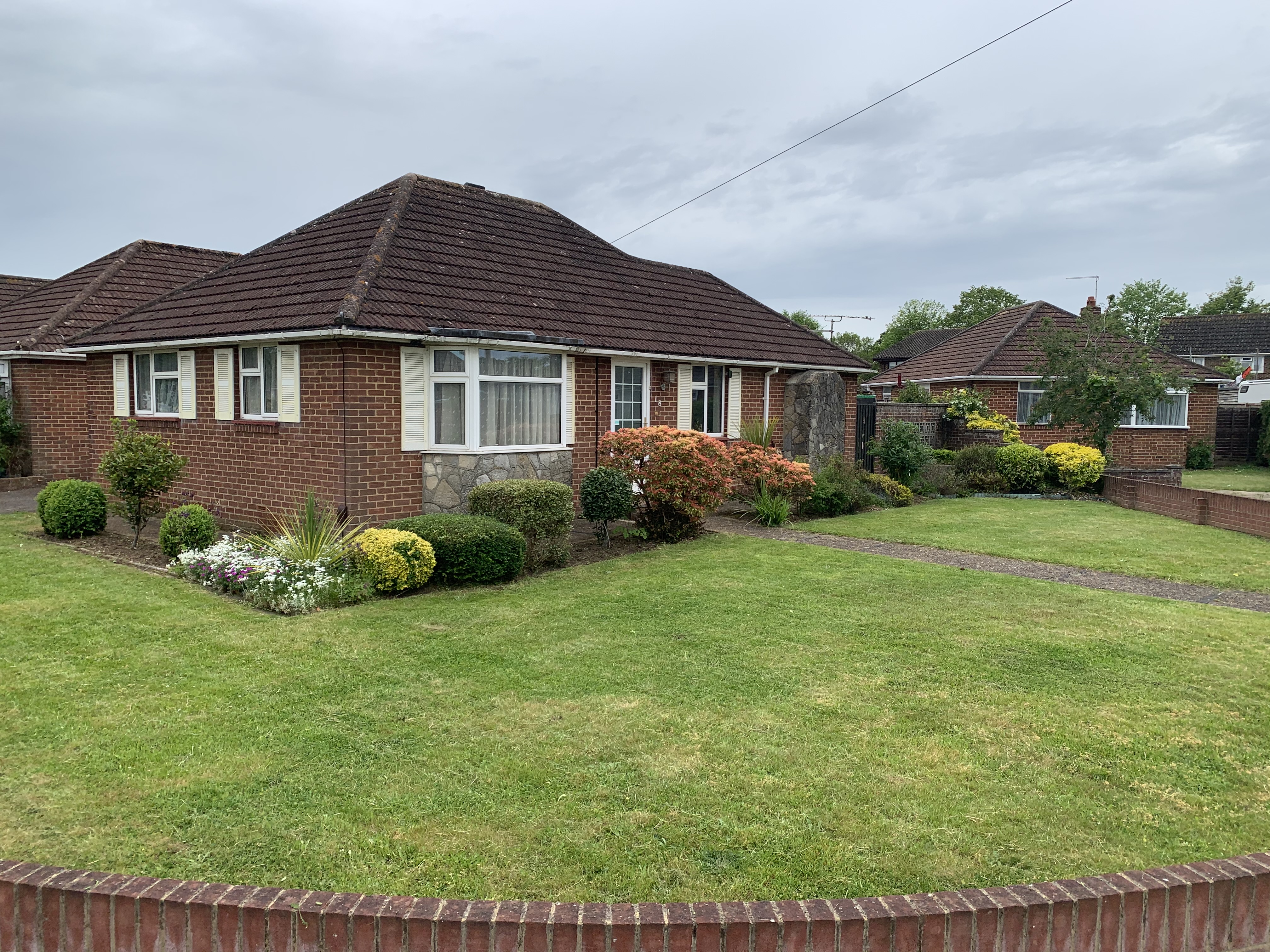 Well-maintained front garden with borders